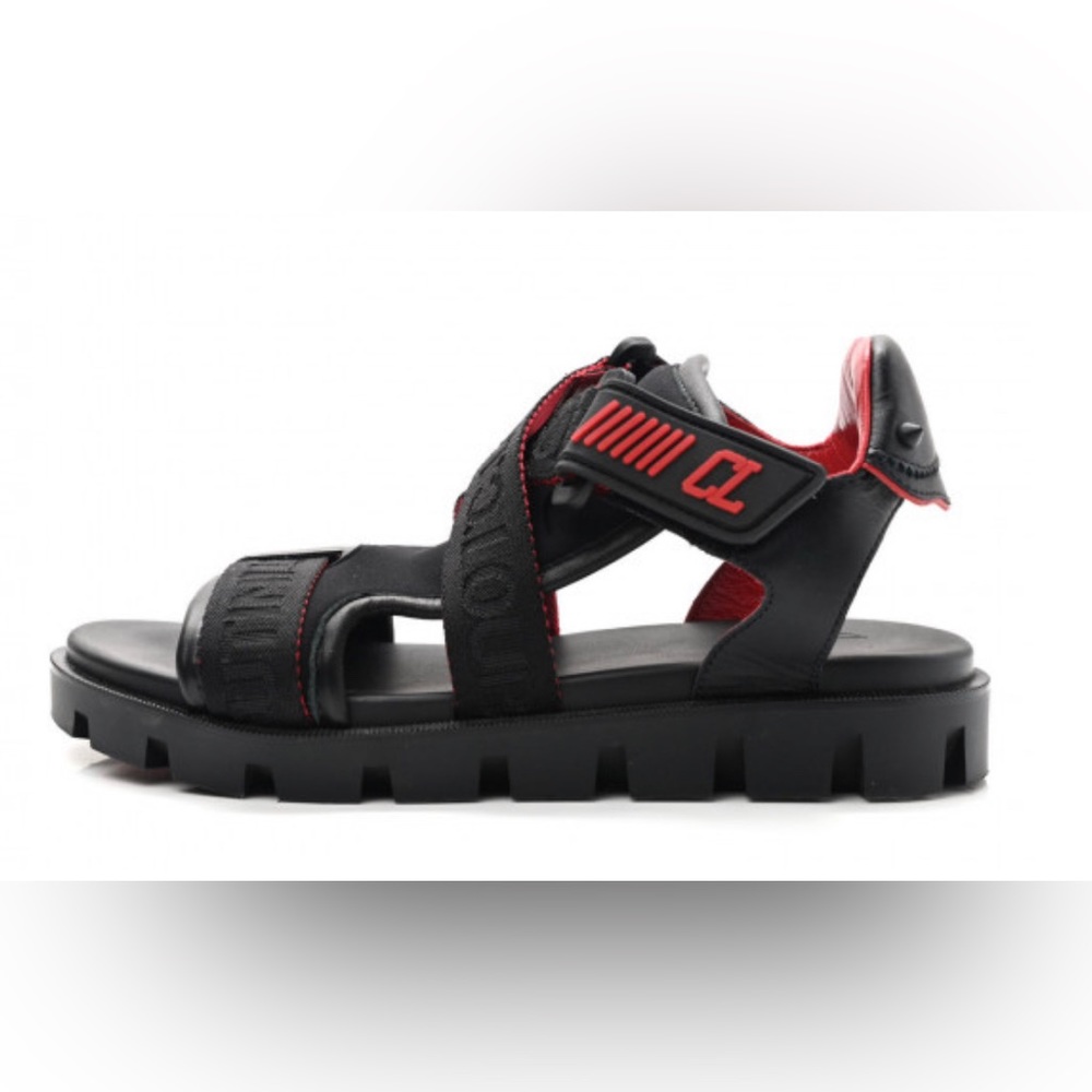 CHRISTIAN LOUBOUTIN
Calfskin Velcrissimo Flat Sandals: size 38.5
